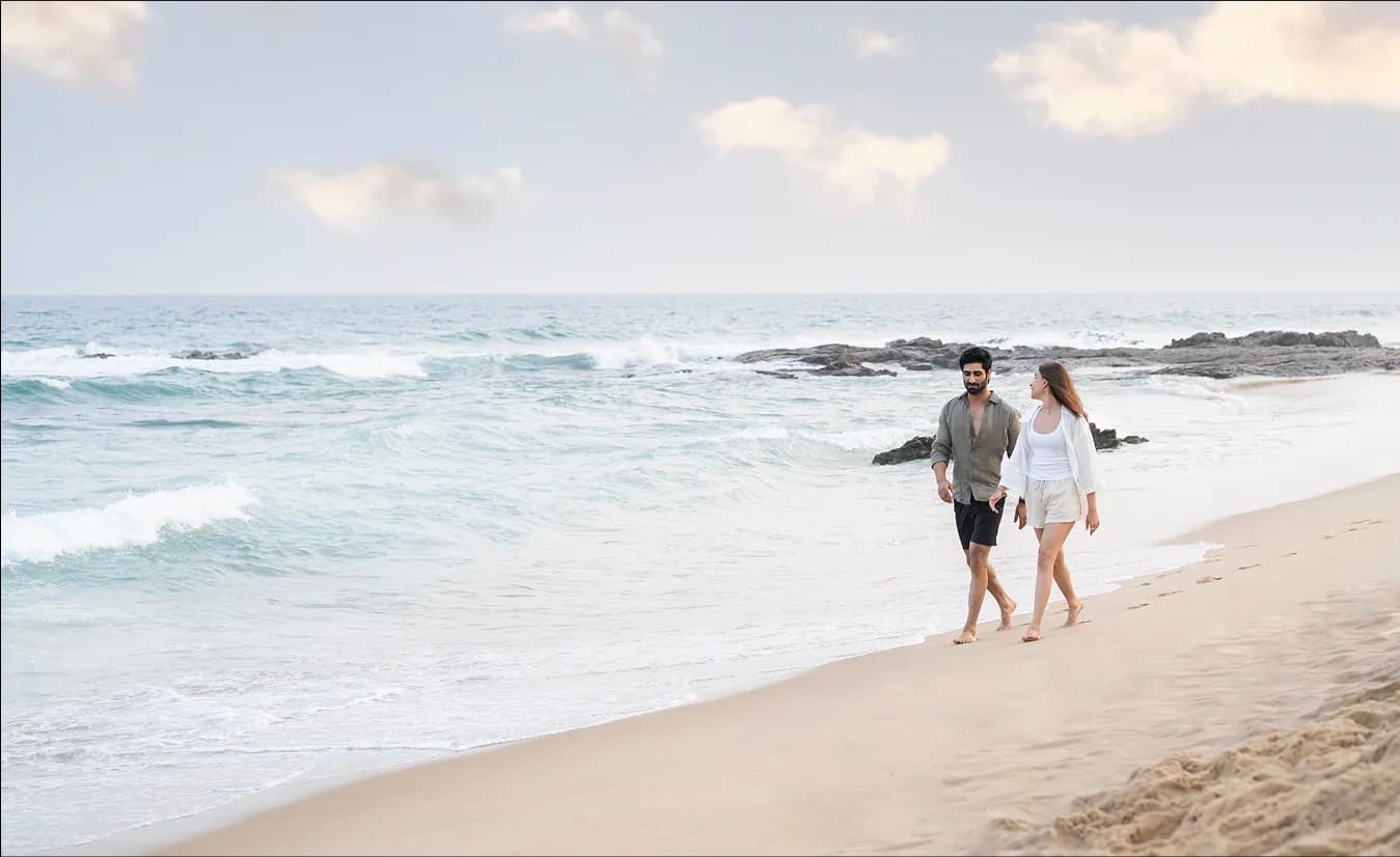 Private beach with couple walking